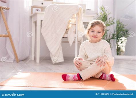 Adorable Child Sitting On The Carpet Stock Photo Image Of Activity