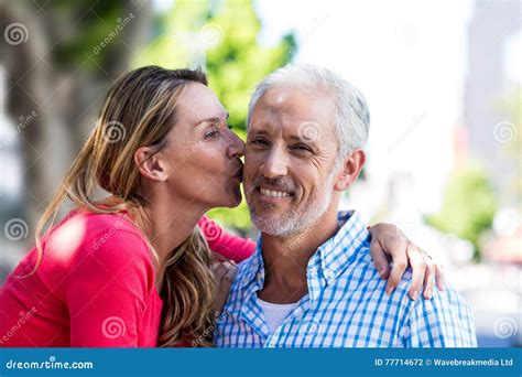 Romantic Mature Woman Kissing Man Stock Photo Image Of Joyful Couple