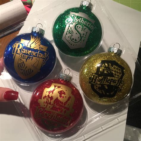 We had a blast making each of our potions and seeing them come to life. Harry Potter glitter DIY homemade ornaments circut project HP potter head | Homemade ornaments ...