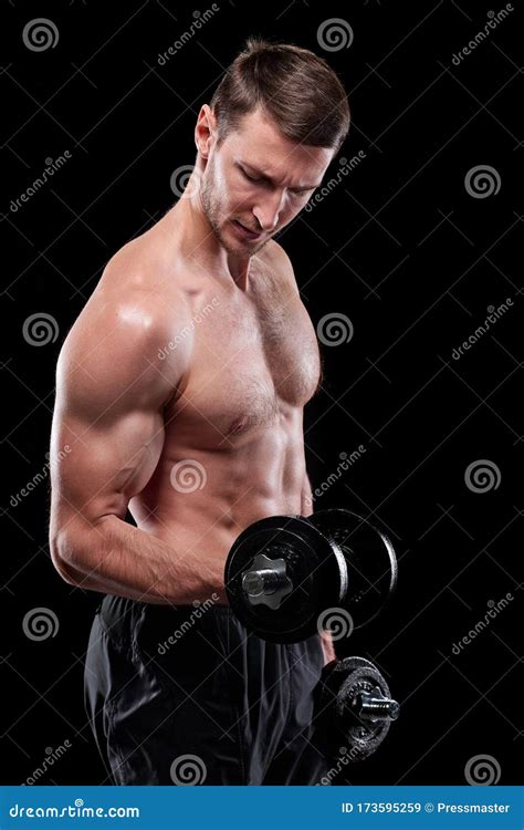 Young Muscular Shirtless Sportsman With Dumbbells Doing Exercise For