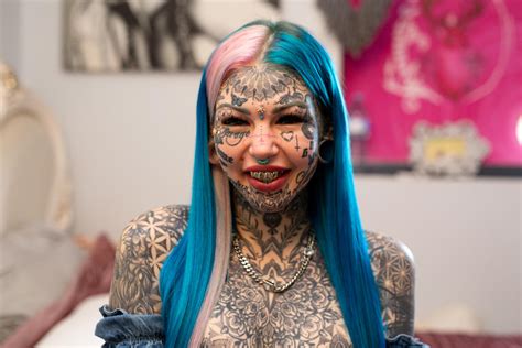 Woman Spends 120k On Body Modifications To Morph Into A Blue Eyes White Dragon