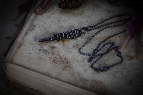 Witch Nail On Antiqued Silver Chain