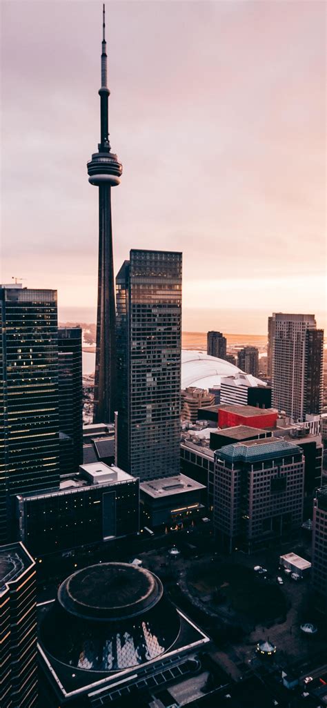 Download 1125x2436 Wallpaper Skycrappers Buildings Cityscape Sunset