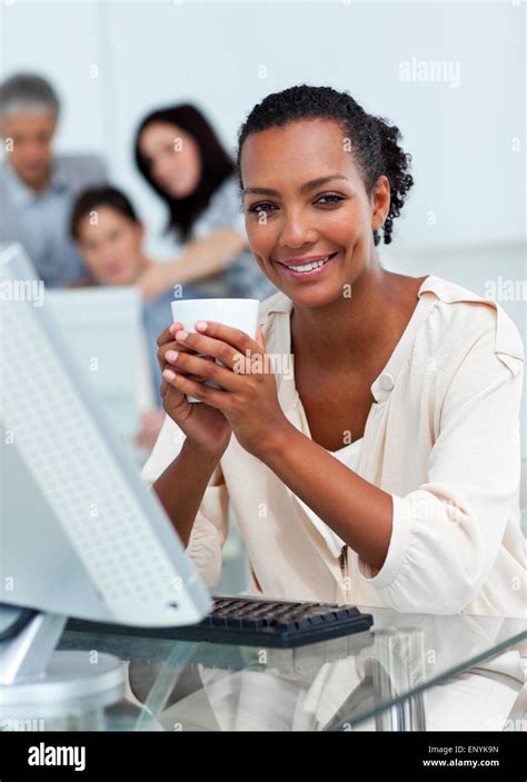 Confident Businesswoman Drinking A Coffee Stock Photo Alamy