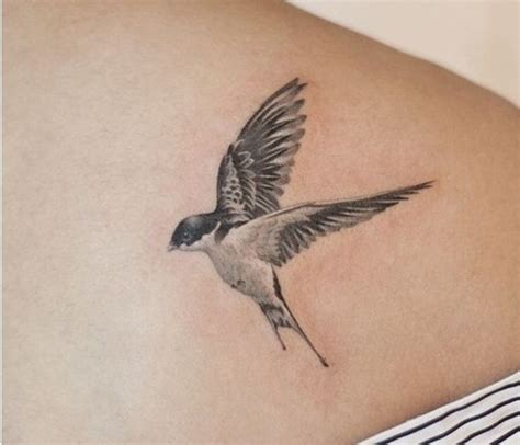 Realistic Flying Bird Tattoo