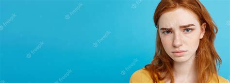 Premium Photo Headshot Portrait Of Tender Redhead Teenage Girl With Serious Expression Looking