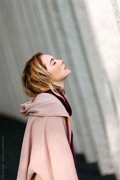 Woman With Head Tilted Toward Sky By Stocksy Contributor Kayla Snell