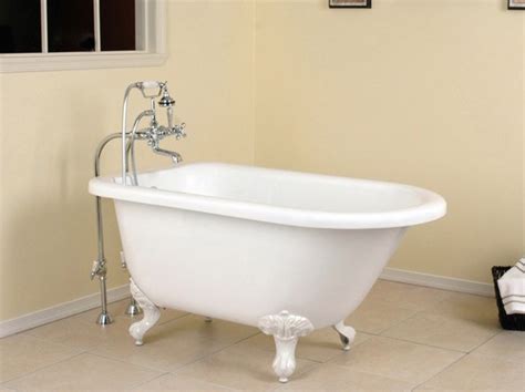 Bathtub sizes and standard bathtub dimensions chart. 9 Small Bathtubs - Tiny Bath Tub Sizes - ElleDecor.com
