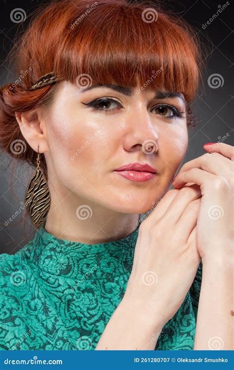 Image Of Pretty Redhead Young Lady In Green Dress Standing With Arms