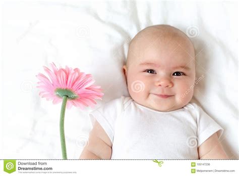 Baby Girl Holding A Flower Stock Photo Image Of Spring 105147236
