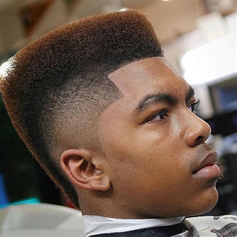 Many women love to wear their hair in this style during their transitioning phase or as a way to just celebrate the beauty of their hair texture. Black Men's Mohawk Hairstyles | Men's Hairstyles ...
