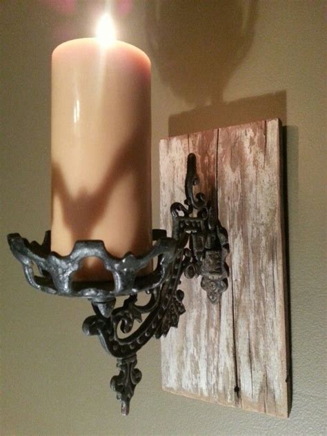 Cast Iron Pivoting Candle Sconce Mounted To Reclaimed Barn Wood So I