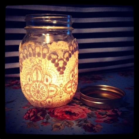 Mason Jar Wrapped In Crochet Work With A Tea Light Candle Inside