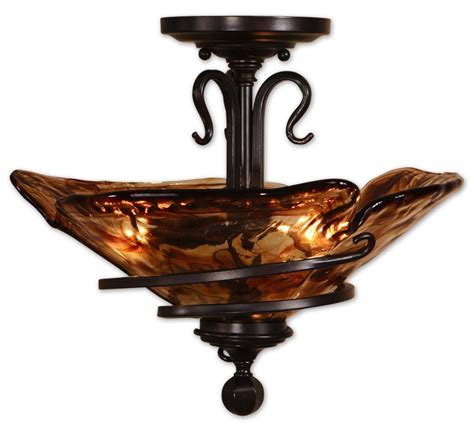 A classic arts & crafts piece, it features handcrafted art glass in shades of sapphire blue, warm honey, amber. 3 Light Semi Flush Mount Ceiling Light Fixture UVU22269