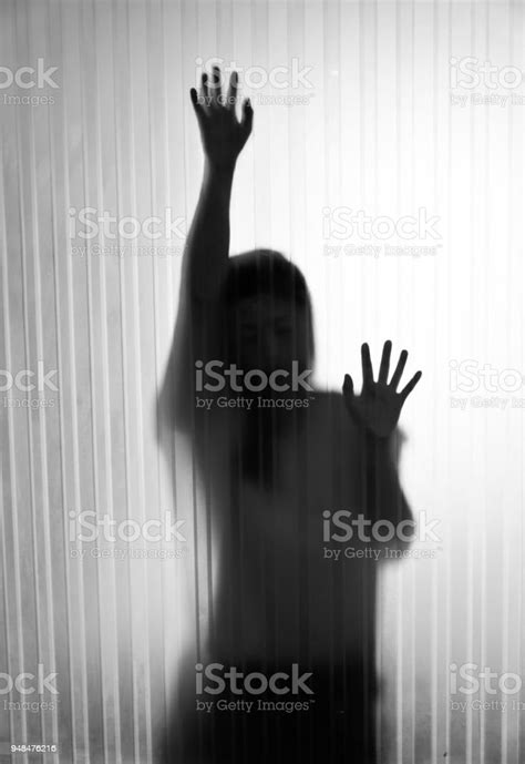 Woman Trapped Behind Frosted Glass Stock Photo Download Image Now
