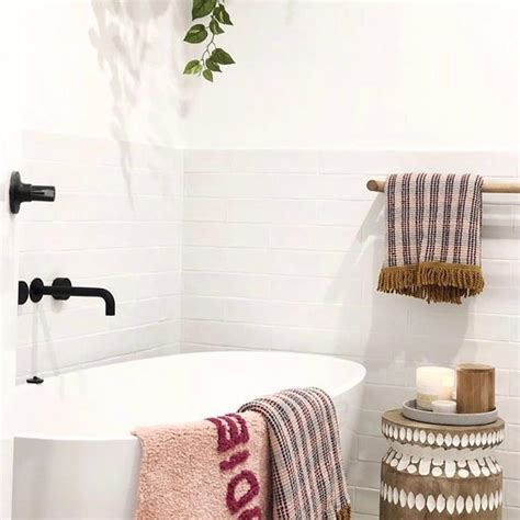 First, straighten up the vanity with sink accessories: Funky textiles and rustic bathroom accessories really jazz ...