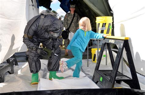 388th CBRN Soldiers train with local first responders, children bring