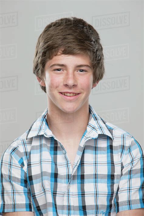 Portrait Of Teenage Boy 14 15 Smiling Stock Photo Dissolve