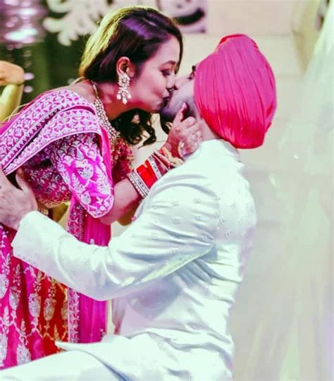 Neha Kakkar Sparkles In Pink Lehenga Kisses Rohanpreet Singh In New Pics From Sangeet