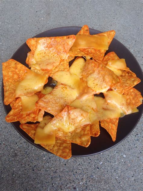 Doritchosmy Latest Creation Just Put Doritos On A Plate Put Cheddar Cheese On Top And Melt
