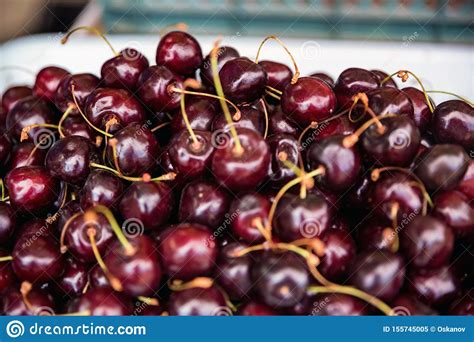 Pile Of Fresh Organic Cherries For Sale At Local Market Stock Image