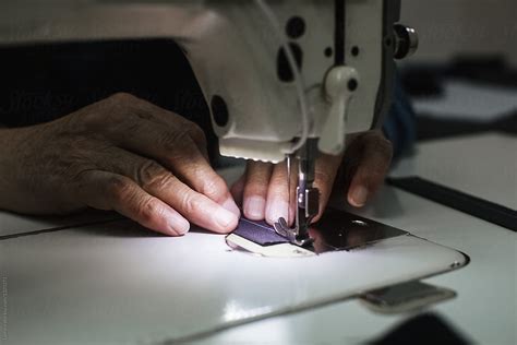 Man Using Sewing Machine By Stocksy Contributor Lumina Stocksy