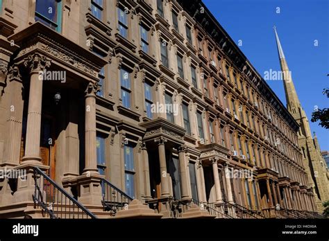 Renovated Classic Brownstone Apartment Buildings With Ephesus Church Of