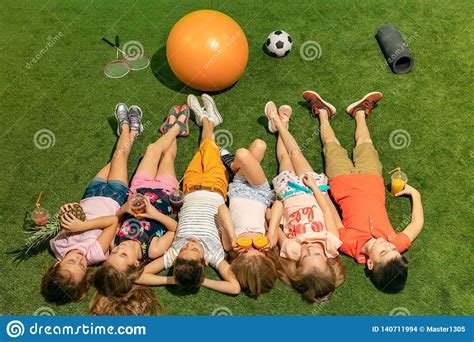 Group Of Happy Children Playing Outdoors Stock Photo Image Of Child