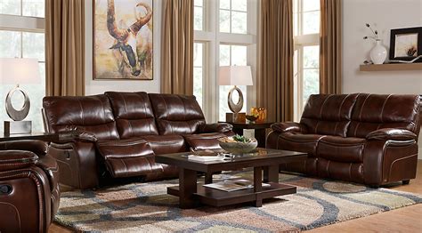 It utilizes a light wall and flooring color to allow the blackness of the furniture to stand out. Beige, Black & Brown Living Room Furniture: Decorating Ideas