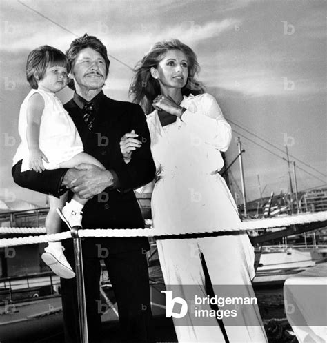 image of charles bronson and his wife jill ireland with their daughter