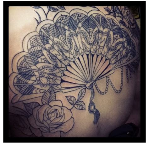 You can add different elements to your tattoo to show multiple passions. Fan tattoo | Best tattoo design ideas