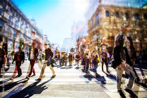 Crowd Of Anonymous People Walking On Busy City Street Stock Photo