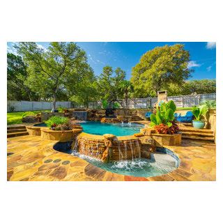 Freeform Pool With Negative Edge Grotto And Spa Tropical Swimming