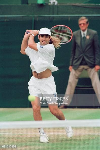 American Tennis Player Andre Agassi Pictured In Action To Win His