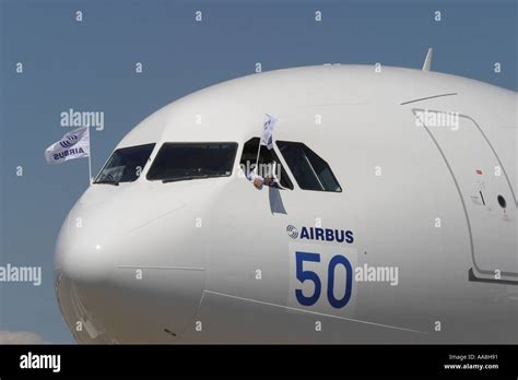 Airbus A340 Long Range Commercial Passenger Airliner With Airbus Flags