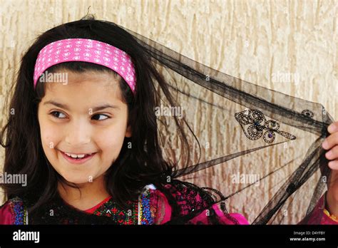 Kuwait Kuwait City Of Smiling Kuwaiti Girl In Traditional Dress With
