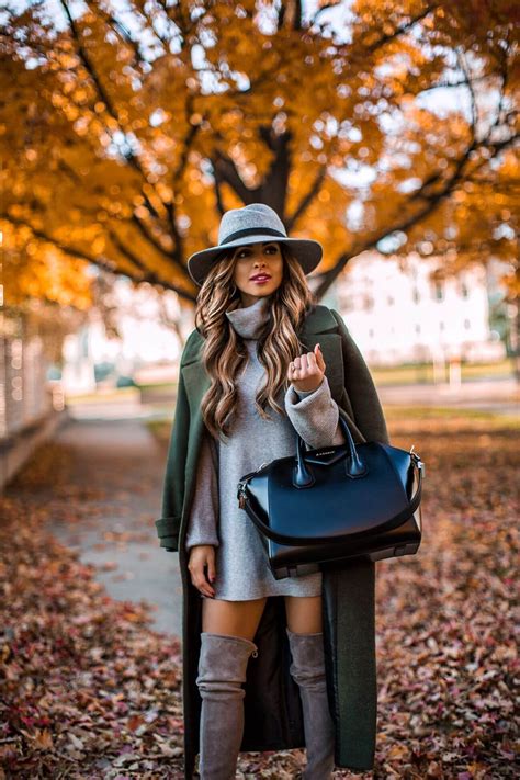 Fashion Blogger Mia Mia Mine Wearing A Gray Sweater Dress And A Gray
