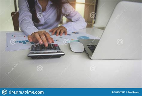 Close Up Of Female Accountant Or Banker Making Calculations Savings Finances And Economy