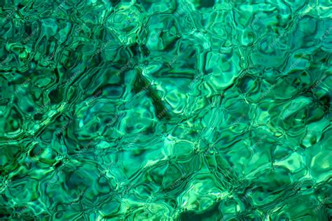 Premium Photo Crystal Clear Emerald Sea Surface