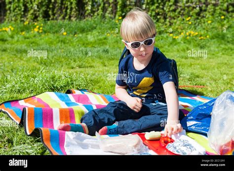 4 Year Old Boy Eating Vegetables Stock Photo Alamy