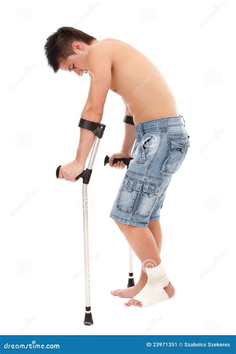 Young Man With Crutches Stock Image Image Of Support 23971351