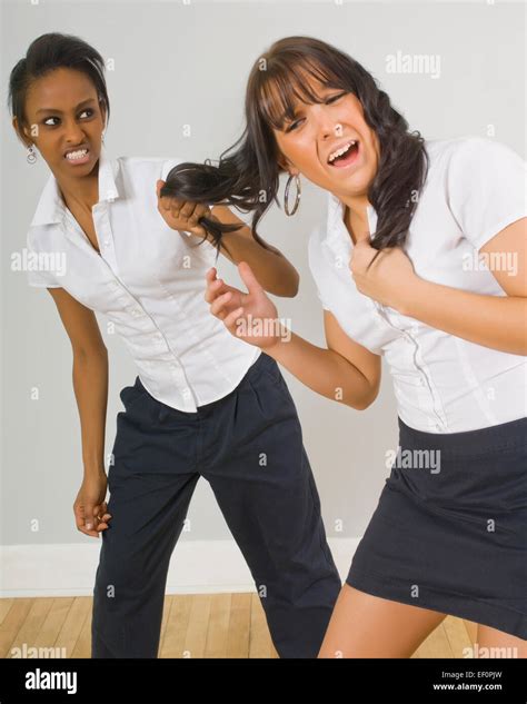 Girl Pulling Another Girls Hair Stock Photo Alamy