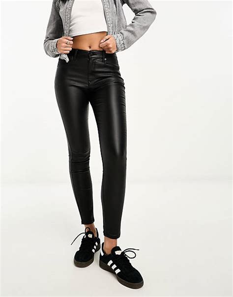 stradivarius skinny coated high waist jeans in black asos