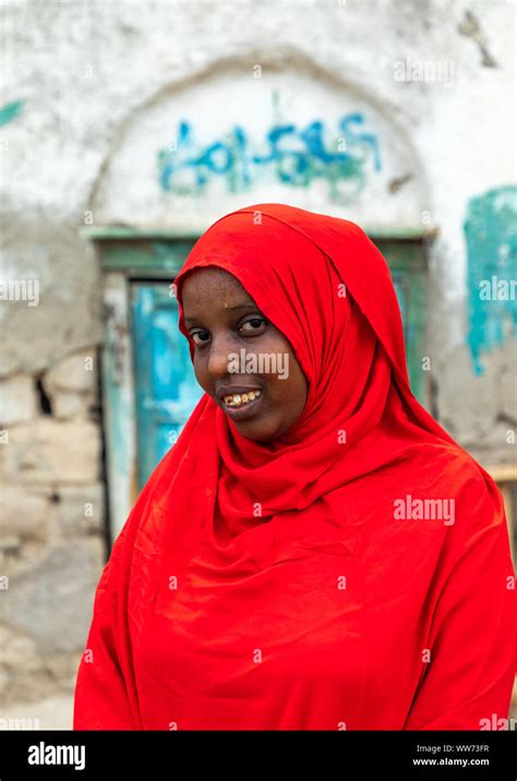Portrait Of A Somali Woman In Red Hijab In The Streets Of The Old Town