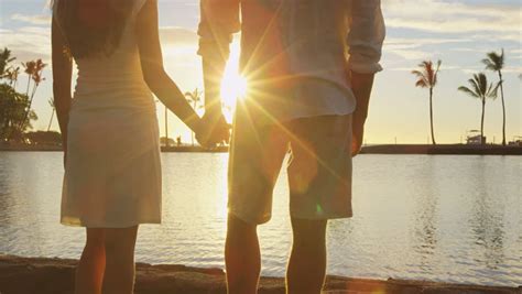 Honeymoon Couple Romantic At Sunset Holding Hands Royalty Free Video