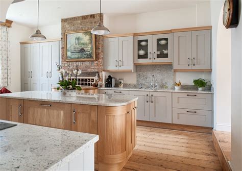 Summer is almost gone but there's still time to save! natural oak cabinets kitchen farmhouse with shaker style square wall and floor tiles
