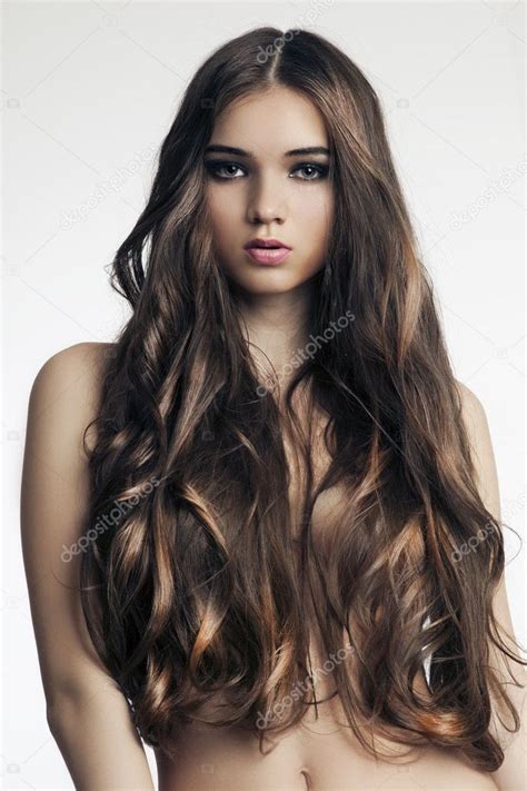 Beautiful Woman With Perfect Skin And Long Curly Hair Stock Photo By