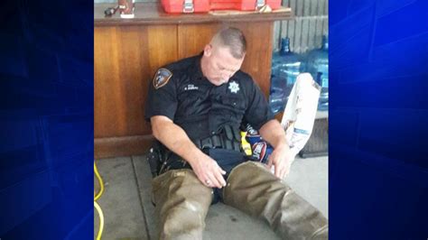 Photo Of Deputy Resting After Rescuing Harvey Flood Victims Goes Viral