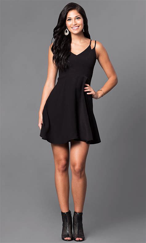 A printed sleeveless dress would look great. V-Neck Semi-Casual A-Line Dress - PromGirl