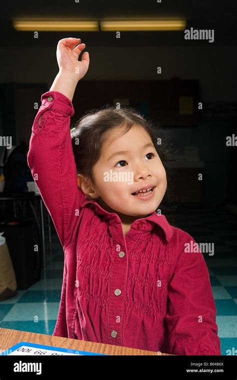 A Girl With His Arm Raised Stock Photo Alamy